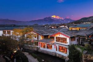 Lijiang MuYa Chinese Courtyard Hotel with Water View, Lijiang