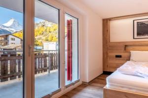 Studio Enzian - Matterhorn Sicht bei der Bergbahn Inspiringplaceszermatt, Zermatt