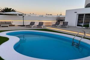 LAS MAGNOLIAS -Villa adosada con piscina privada, Corralejo