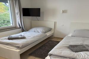 Gemütliche Monteurwohnung in mit Küche und Balkon Apartments, Offenbach