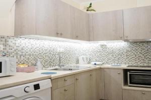 Ipsos Wave Apartments, Ypsos
