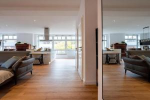LüneBase Loft - Traum zwischen Altstadt und City Apartments, Luneburg