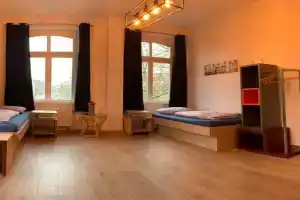 Ein Zimmer in einer 4-Zimmer-Wohnung in mit Gemeinschaftsküche und -Bad Guest house, Leipzig