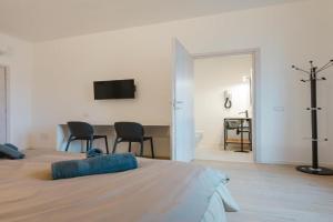 Luminosa stanza 4 bagno privato vicino Stazione Guest house, Padua