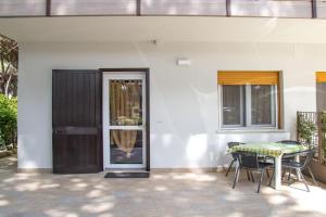 Modern accommodation with a lovely patio Apartments, Eraclea Mare