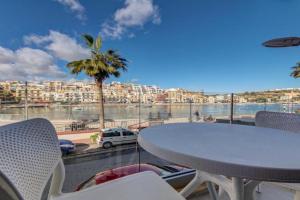Seafront home with private terrace in Marsascala by 360 Estates Apartments, Marsaskala
