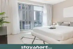StayShort - Comfortable 1BR Minutes from Burj Khalifa & Mall Apartments, Dubai