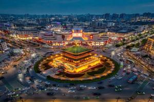 Mehood Hotel Ideally located in the heart of the city, just steps from the historic Ancient Wall and Yuxiangmen Metro A short 3-stop ride to the Bell Tower, Xi'an