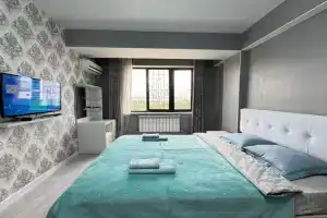 One bedroom and a guest room in residential building Panfilov, Bishkek
