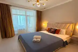 ZhK Tandau, Hanshatyr, Tsentr materinstva i detstva Apartments, Astana