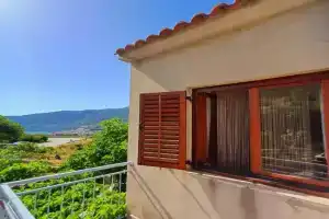 Apartman Mihaela, Comisa