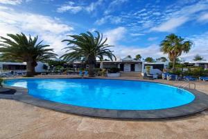 Bungalow Playa Bastian - Piscina climatizada - Wifi - Playa 1 min. Apartments, Costa Teguise