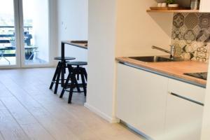 sky Apartments, Bagnole