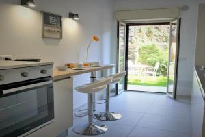 Casa Gisé, Aci Castello