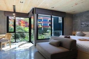 Relife Windy by Holy Cow, studio with sofa-bed, Nai Harn