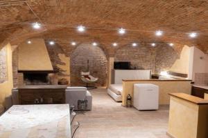 another brick in the vault Apartments, Spello