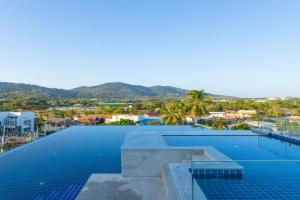 Sara's Nest - Top Floor Seaview apartments, Nai Harn