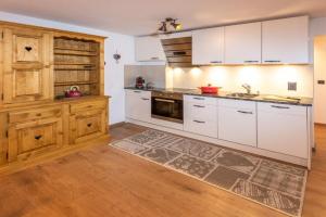 Touring Chez Georges Apartments, Grachen