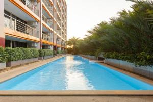 NaiHarn Pearl condo by Holy Cow, 1-BR, courtyard view Apartments, Nai Harn