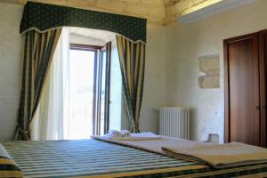 Rooms Dimora Arco - Affitti Brevi Italia, Monte Sant'Angelo