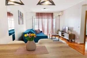 Harizma apartmani, Kraguyevats