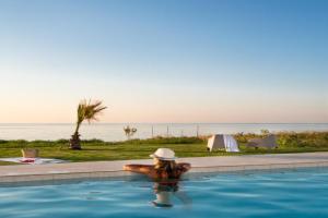 Beachfront Nymphes Aigli with Private Pool, Children Area & BBQ Villa, Sfakaki