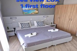 BLUE EYES APARTMENTS, Ixia