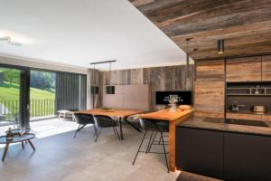 Das luxuriöse alpine Apartment in der Residenz Silvretta, See