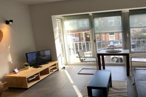 Marlon B. Apartments, De Haan