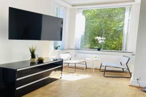aday - mansion - Open bright apartment with garden, Aalborg