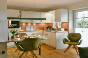 Speicherhaus Ferienwohnung Deichnest Apartments, Wangerooge
