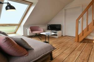 Uns to Hus - Ferienwohnung Suennupgang Apartments, Juist