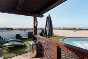 Sunset Deluxe con jacuzzi, piscina y barbacoa Apartments, Coma-Ruga