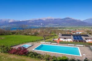 Sole 1 Terrassen Ferienwohnung mit Pool OG Apartments, Colico