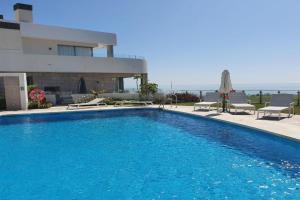 Luxury beachfront apartment with pool, sauna, fitness and gym in province Malaga, Andalusia, Fuengirola