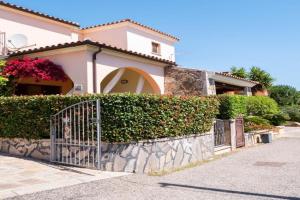 Villetta spiaggia a piediAffitti Apartments, Budoni