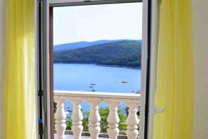 Holiday house in with sea view, air conditioning, WiFi, washing machine 577-1, Rabac