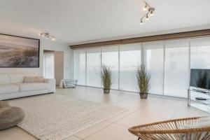 Gelijkvloers zeedijk appartement - lichtrijk en modern Apartments, Blankenberge