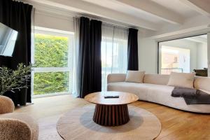 Charmante Ferienwohnung mit Terrasse - nur 50m zum Strand mit eigenem Parkplatz und Fahrradunterstellmöglichkeit Apartments, Sierksdorf