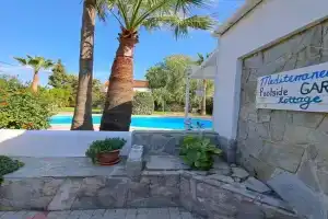 Mediterranean poolside garden cottage, Kiti