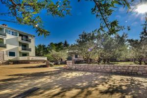 in olive garden Apartments, Starigrad