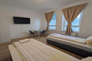 Modernes Apartment mit 2 Schlafzimmern und Privatparkplatz nahe Innenstadt, Neumunster