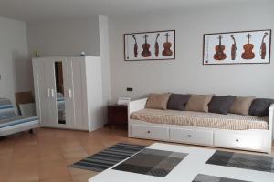 La strada del liutaio nel cuore di Apartments, Cremona