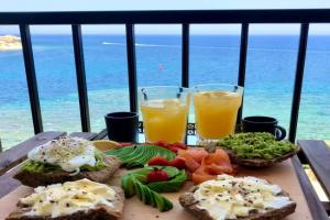 Beach front High End apartment, direct sea views., Marsalforn