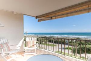 LETS HOLIDAYS Beach front apartment in Mar, Pine Beach, Castelldefels
