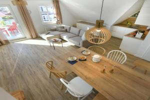 Haus am Dorfbrunnen Ferienwohnung Sand Apartments, Wangerooge