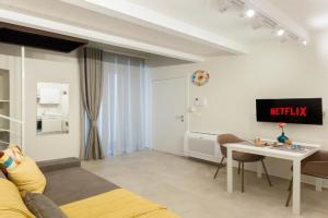 ALIBI SUITES Loft: Centralissimo con Free WiFi, Netflix, A/C e tutti i Comfort, Ruvo di Puglia