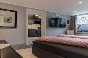 Ferienwohnung Am Schloßpark Apartments, Tonning