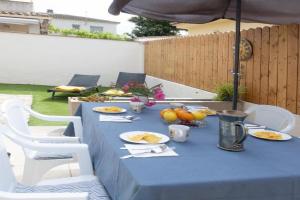 Gerkens, bonita casa de tres dormitorios con piscina comunitaria en Escala, L'Escala