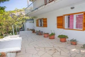Apartments by the sea Cove Zarace, - 20924, Hvar